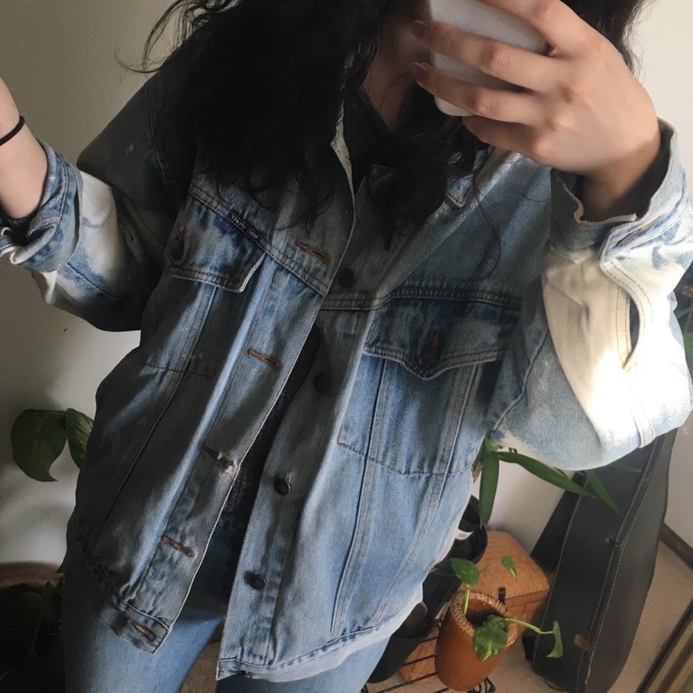 Distressed acid wash denim jacket